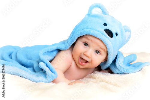 smiling baby boy on a white background. place for text