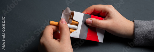 Obraz na plátne Conceptual depiction of cigarette addiction, showing dependency on smoking, highlighting health risks, habitual behavior, withdrawal struggle, and the impact of nicotine on daily life