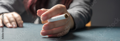 Obraz na plátne Conceptual depiction of cigarette addiction, showing dependency on smoking, highlighting health risks, habitual behavior, withdrawal struggle, and the impact of nicotine on daily life