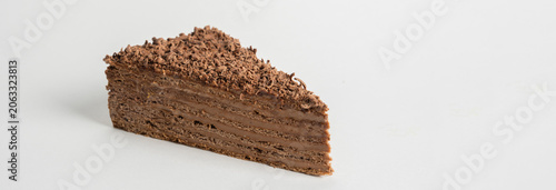 Fotografie A Micado piece, a small, crispy, chocolate-coated biscuit stick, perfect for snacking, dessert accompaniment, or sweet indulgence