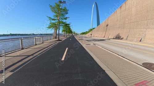 Immersive POV from a bike ride on the St Louis Riverfront trail along the Mississippi River towards Gateway Arch