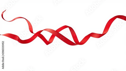 Long, straight red ribbon with a shiny curve floats in the air. Used for wrapping gifts at birthday parties, made of textile cloth. Isolated on a white background