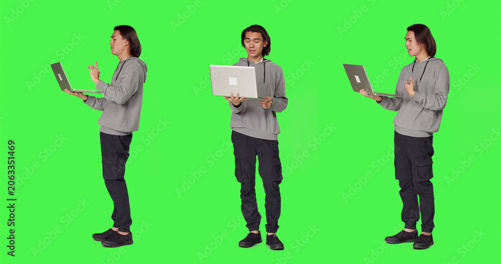 Obraz premium Model waving at online videocall on laptop, meeting with people on internet connection videoconference, asian person holding pc and chatting with friends on conference call, green screen