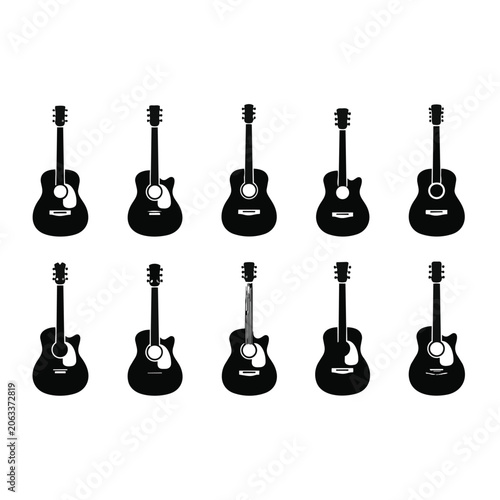 Multiple black guitars in various positions.