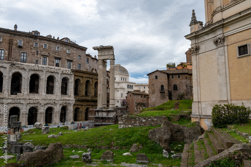 Obraz premium Architectural history in details of ruins, old buildings, walls, amfitheatres, arches in old part of Rome, dated from 300 BC, guided tours in Rome, Italy