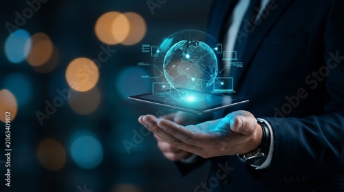 Hand holding digital globe with futuristic technology interface in dark urban setting
