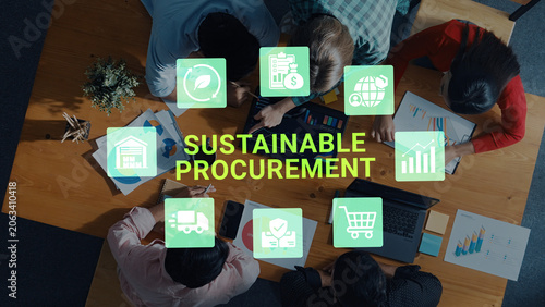 Quadro su tela A modern office scene showcasing a diverse team collaborating on sustainable procurement strategies, utilizing charts and digital tools to drive responsible business decisions