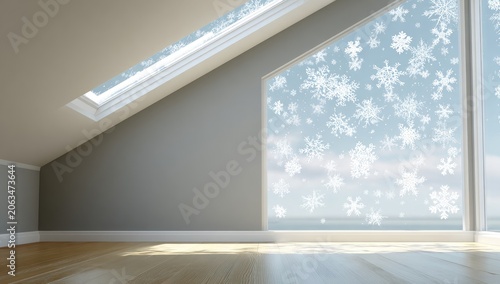 Empty attic room with large window, snowflakes