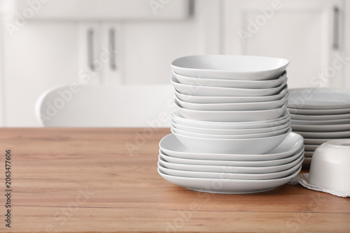Clean white stacked dinnerw...