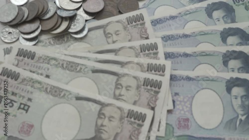 Japanese Yen money. close up of the Japanese yen on hand. currency of Japan that is used to change, buy, sell, accumulate, invest, financial, exchange rate, value, accounting, international exchange