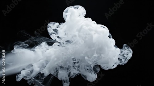 white smoke on black background.