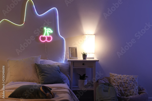 Stylish teenage room with c...