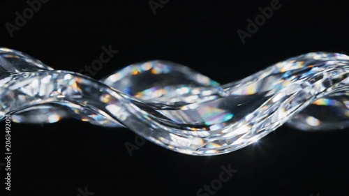 Clear liquid wave on black background.