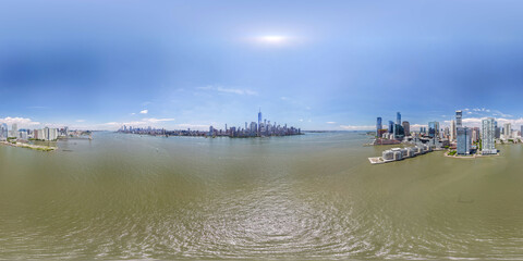 Hudson river dividing new york city and new jersey skylines