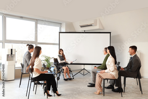 Female business speaker in ...