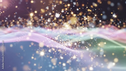 Glowing particles on colorful background.