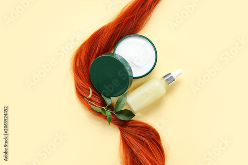 Red strand with jar of hair...