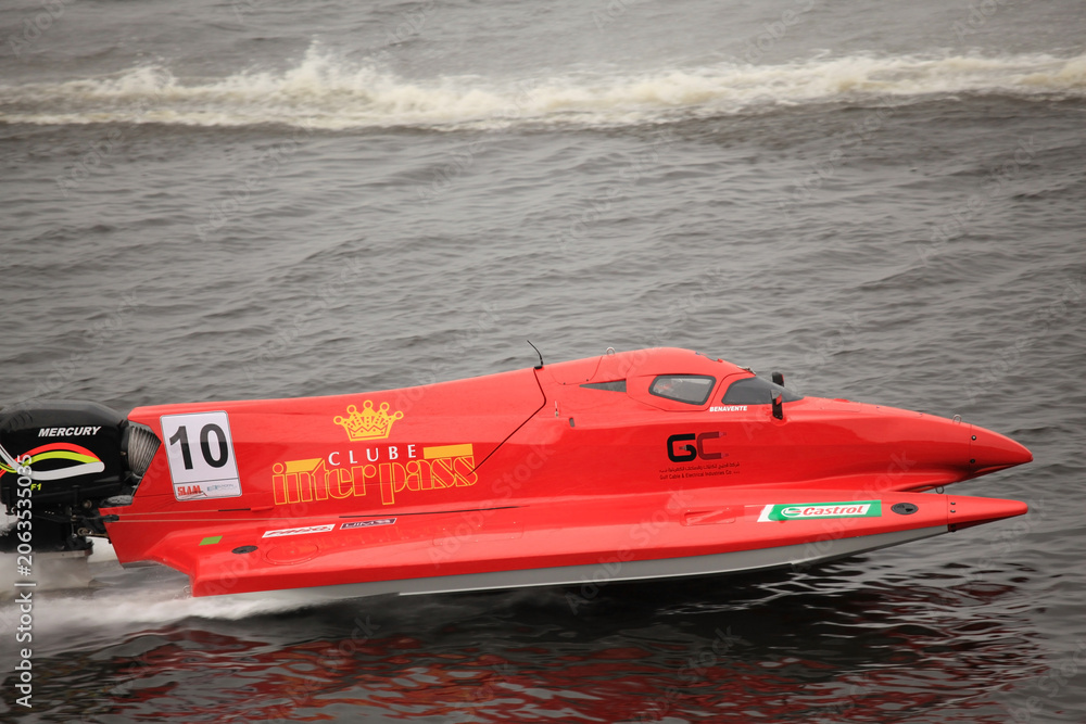 Naklejka premium July 22, 2012 – Kyiv, Ukraine: Amazing high-speed Formula 1 powerboat from Team Sweden racing across the water surface during a thrilling international motorsport event