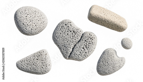 Tablou pe pânză Assorted natural pumice stones for foot care and exfoliation arranged on a white