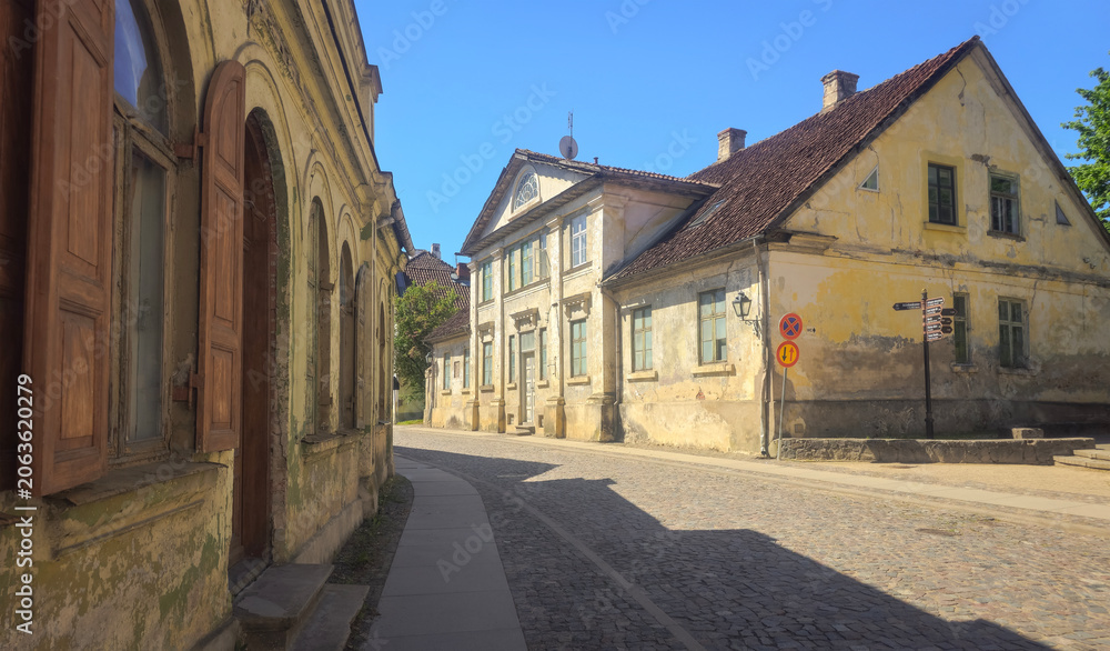 Fototapeta premium Historic Brick Buildings on Cobblestone Square