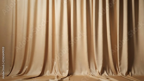 Luxurious beige curtain with soft folds and warm lighting effects