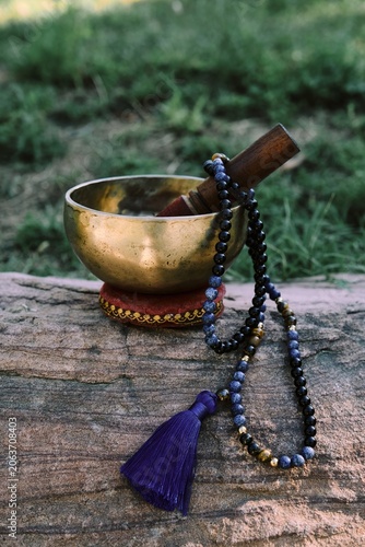 Tibetan singing bowl with rosary mala