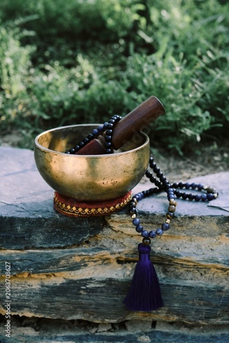 Tibetan singing bowl with rosary mala