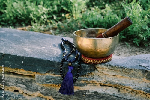 Tibetan singing bowl with rosary mala
