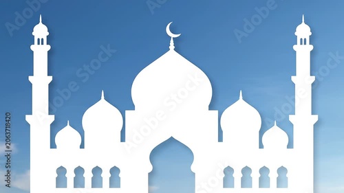 White Mosque Silhouette Against Blue Sky.