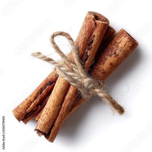 Bundle of Cinnamon Sticks Tied with Twine on White Background