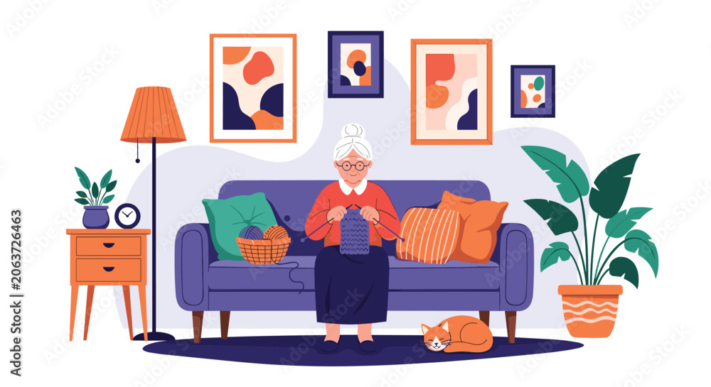 Fototapeta premium Content elderly woman sits on a sofa knitting blue yarn in a cozy living room with a cat plants and decorative paintings.