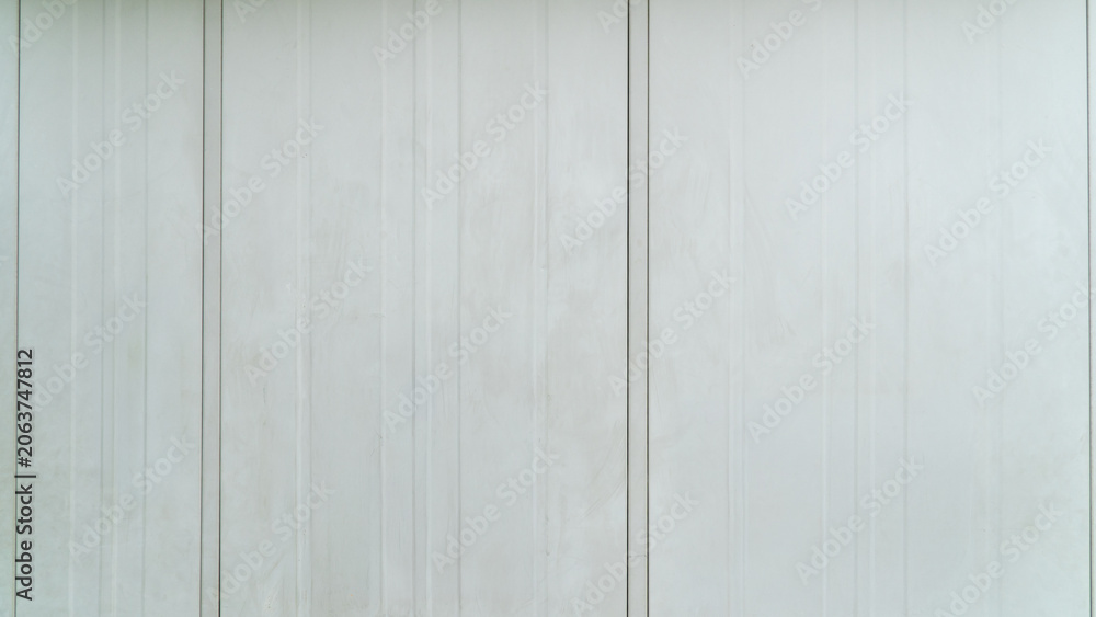 Obraz premium White Painted Metal Siding Panels with Vertical Ribs Texture