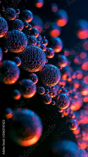Glowing Neon Bubbles Drifting Upward in Dark Liquid Vertical Abstract Loop
