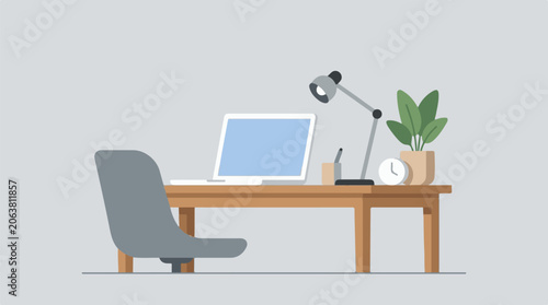 A clutter-free office workspace with laptop and decor