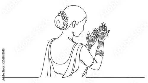 Woman in traditional Indian attire gesturing.