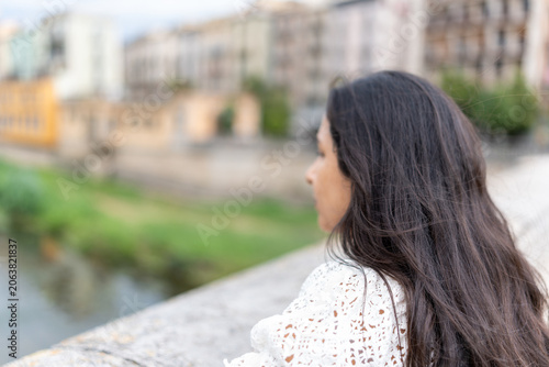Konstfotografi Woman traveling in Girona exploring the city and contemplating architecture view