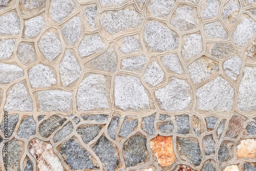 close up of gray stone wall for background.