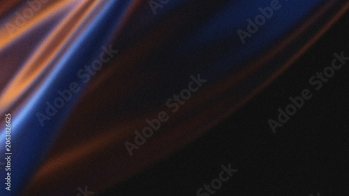 Fotografie Abstract background featuring soft flowing fabric drapes with moody orange and b