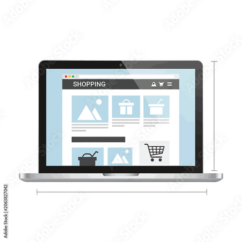Laptop with shopping website on screen.