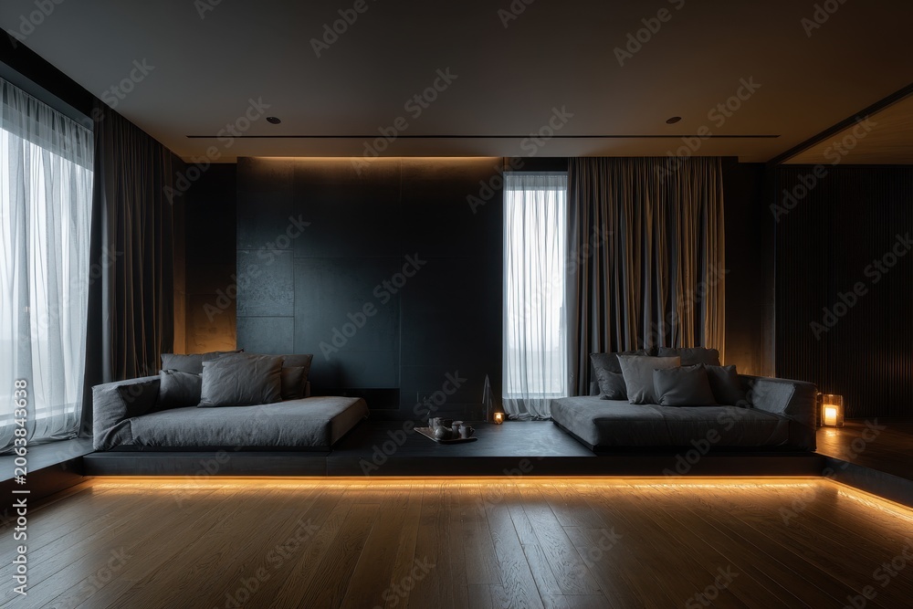 Fototapeta premium Panoramic view of a dark modern living room with a matte black feature wall and minimal furnishings