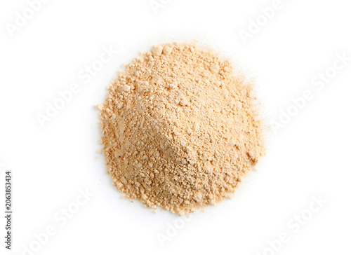 Heap of maca powder isolated on white