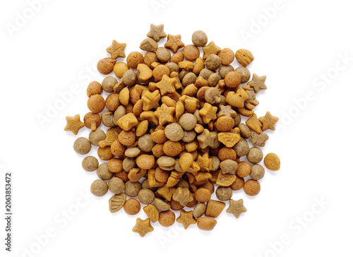 Pile of dry pet food on a white background.
