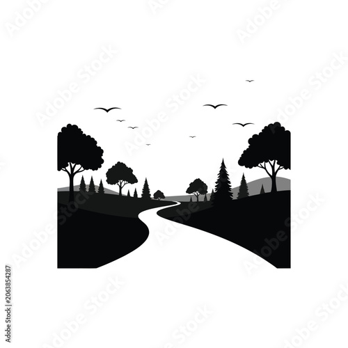 Silhouette of a Winding Road Through a Forest with Birds Flying.