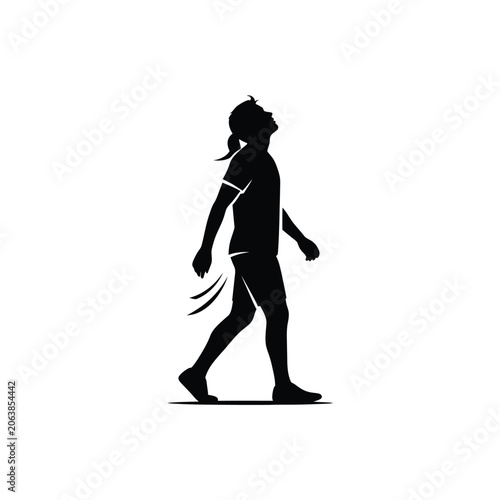 Silhouette of a person walking with head tilted up.