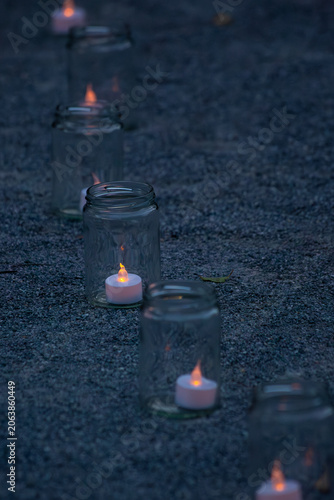 Candle Lights Lining a Path at Dusk