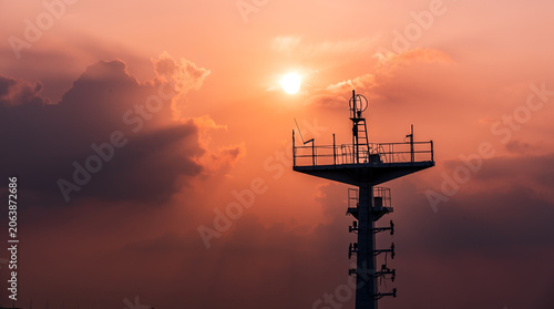 radio tower at sunset