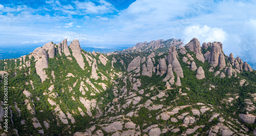 Tablou pe pânză Wide panoramic view of the full serrated conglomerate rock ridge of Montserrat m