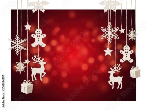 Christmas background with wooden ornaments hanging on a red bokeh background