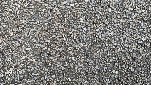 Foto Close-up of exposed aggregate concrete surface showing small stones embedded in