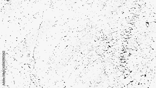 Foto Distress overlay pattern with scattered black speckles and scratches on a white